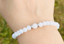 Load image into Gallery viewer, White Crystal Radiance Cradles to Crayons Bracelet - TJazelle HELP Collection