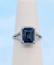 Load image into Gallery viewer, Emerald Cut London Blue Topaz Ring with Diamond Halo &amp; Split Shank - 14K White Gold
