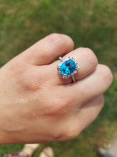 Load image into Gallery viewer, Elongated Cushion Cut Paraiba Blue Topaz Ring with Baguette &amp; Round Diamonds - 14K White Gold