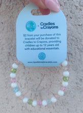 Load image into Gallery viewer, Cradles to Crayons Kaleidoscope Crystal Charity Stacker - TJazelle