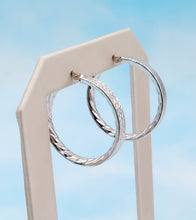 Load image into Gallery viewer, 1.25” Diamond Cut Design Hoops - 14K White Gold