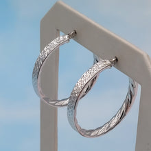 Load image into Gallery viewer, 1.25” Diamond Cut Design Hoops - 14K White Gold