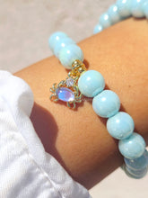 Load image into Gallery viewer, Crab Charm on Light Blue Glass Beaded Bracelet - Elena Michele