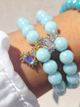 Load image into Gallery viewer, Crab Charm on Light Blue Glass Beaded Bracelet - Elena Michele