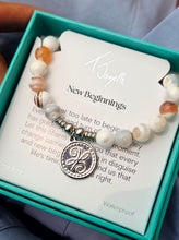 Load image into Gallery viewer, "New Beginnings" Infinite Steel Charm Bracelet - TJazelle