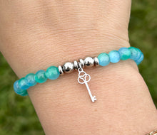 Load image into Gallery viewer, Key To New Beginnings Charm Bracelet - TJazelle HELP Collection