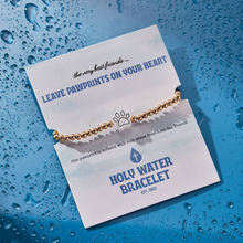 Load image into Gallery viewer, Paw Print Holy Water Stretch Bracelet in Gold