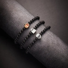 Load image into Gallery viewer, Glow In The Dark Skull Stretch Bracelet