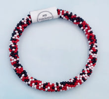 Load image into Gallery viewer, Roll-On® Bracelet Red, Black, and White Speckled