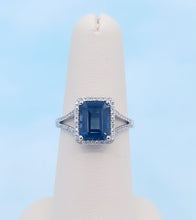 Load image into Gallery viewer, Emerald Cut London Blue Topaz Ring with Diamond Halo &amp; Split Shank - 14K White Gold