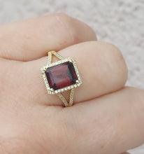 Load image into Gallery viewer, Emerald Cut Garnet Ring with Diamond Halo &amp; Split Shank - 14K Yellow Gold