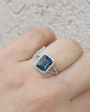 Load image into Gallery viewer, Emerald Cut London Blue Topaz Ring with Diamond Halo &amp; Split Shank - 14K White Gold