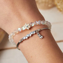 Load image into Gallery viewer, Snowflake Stretch Bracelet with Clear Quartz Beads
